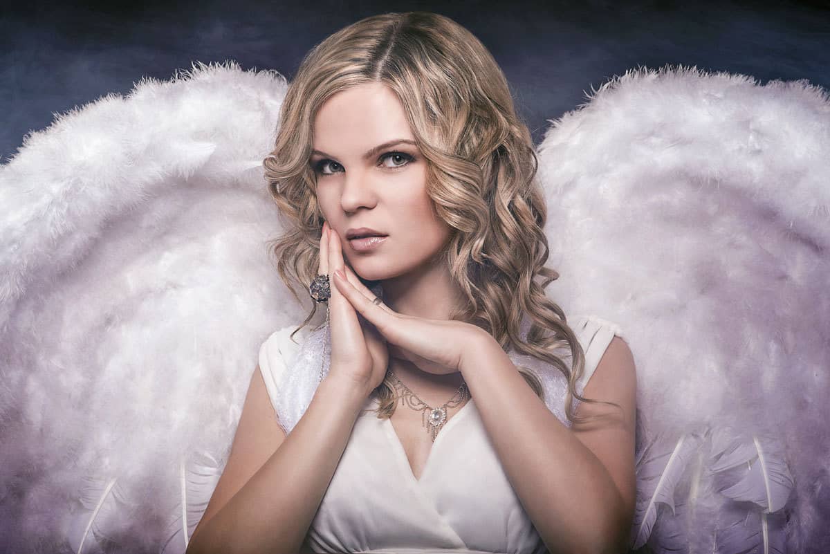 Conceptual studio portrait with sculptural wings